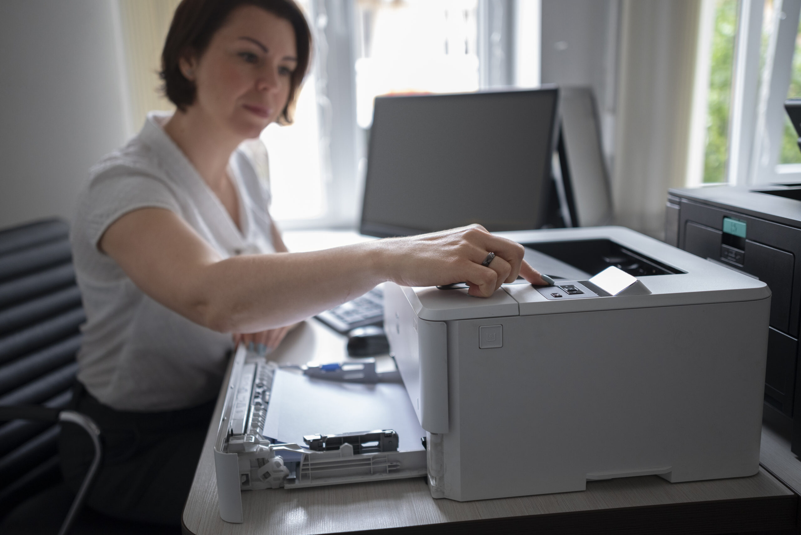 woman using printer at the office